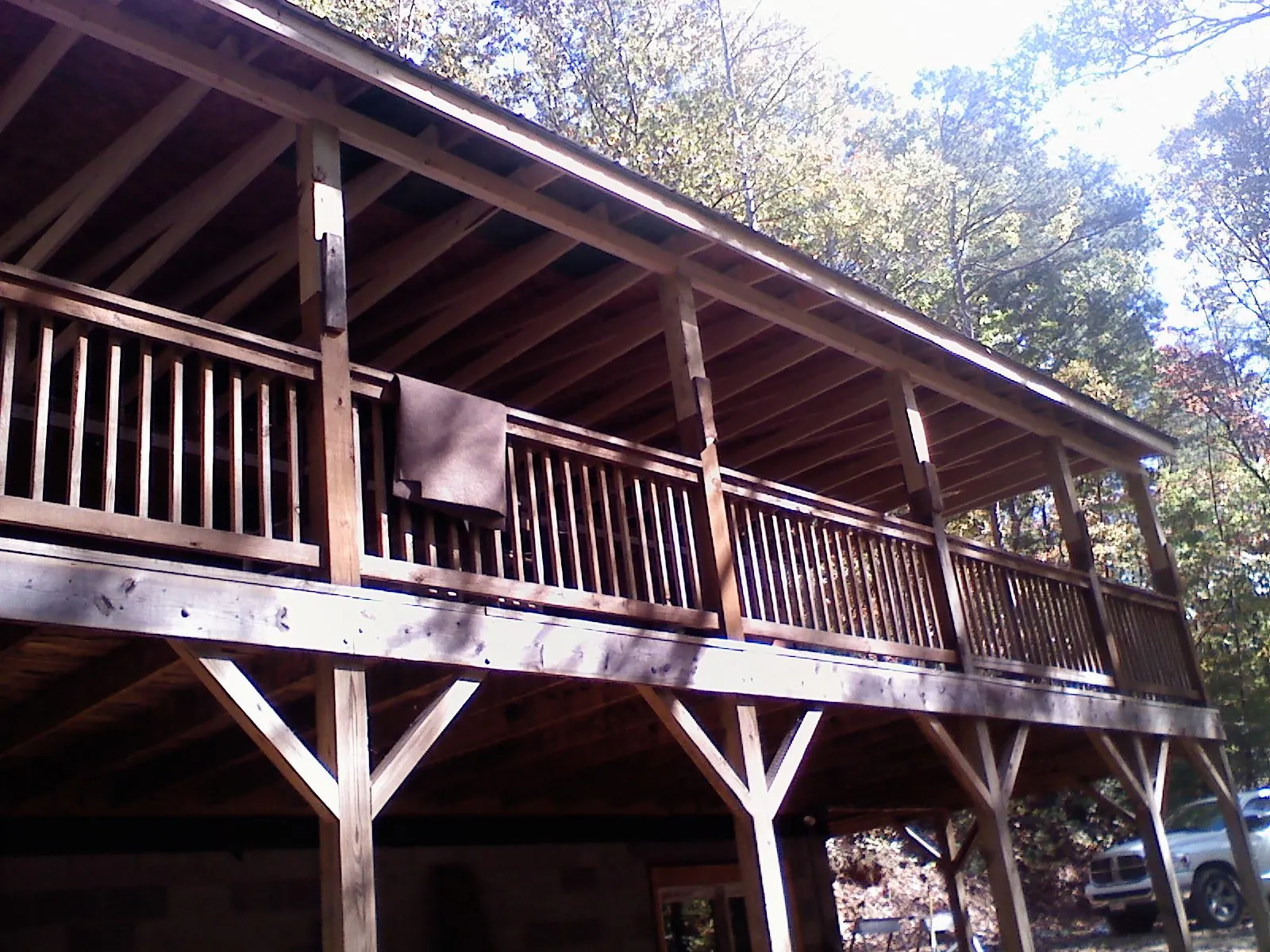 Timber framing under a new elevated porch and deck — Roof Leak Repair in Waukomis by Roofing Brothers